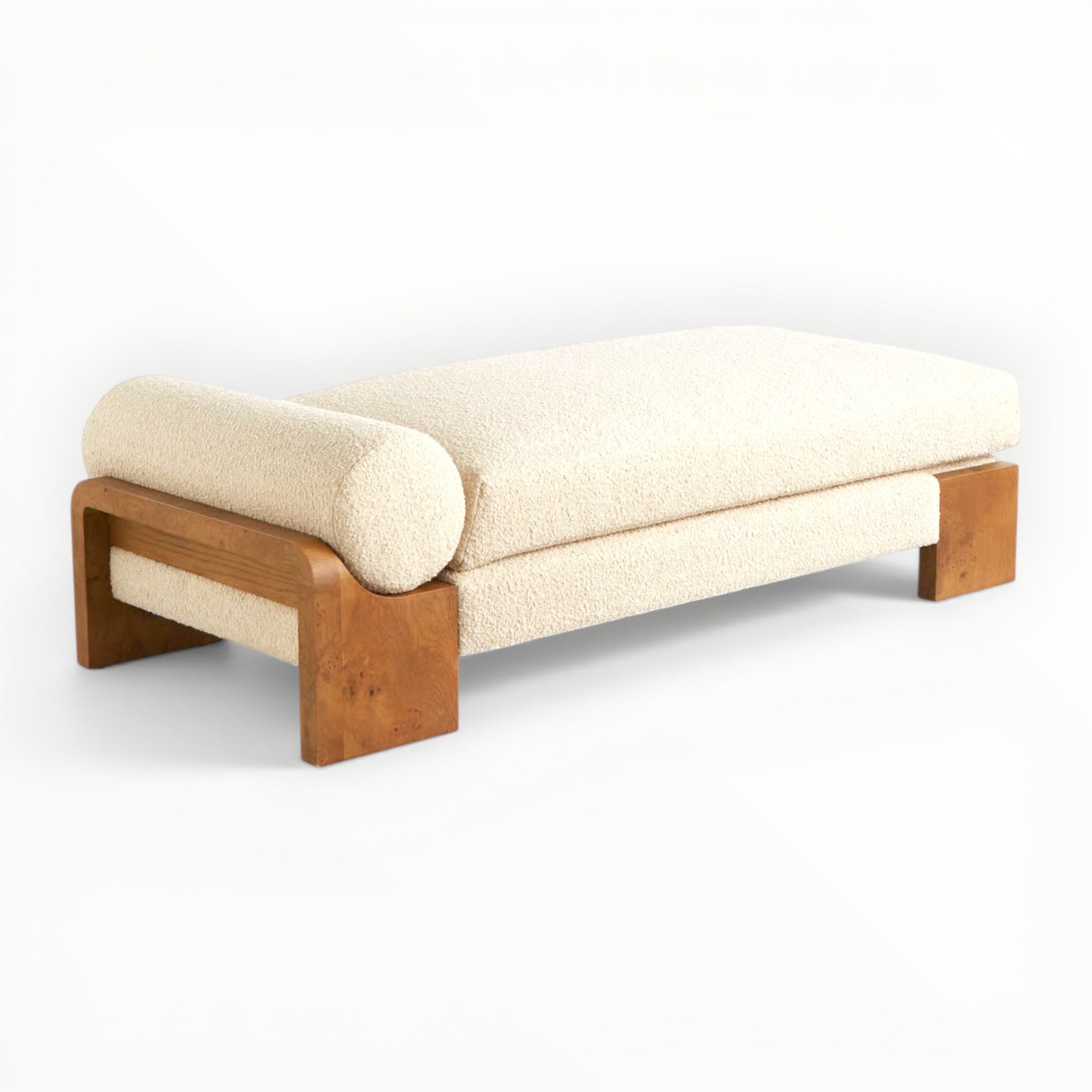 Day bed made in teakwood with beige upholstery in white background