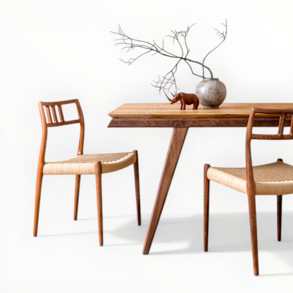 Dining table with two wooden chairs on a white background