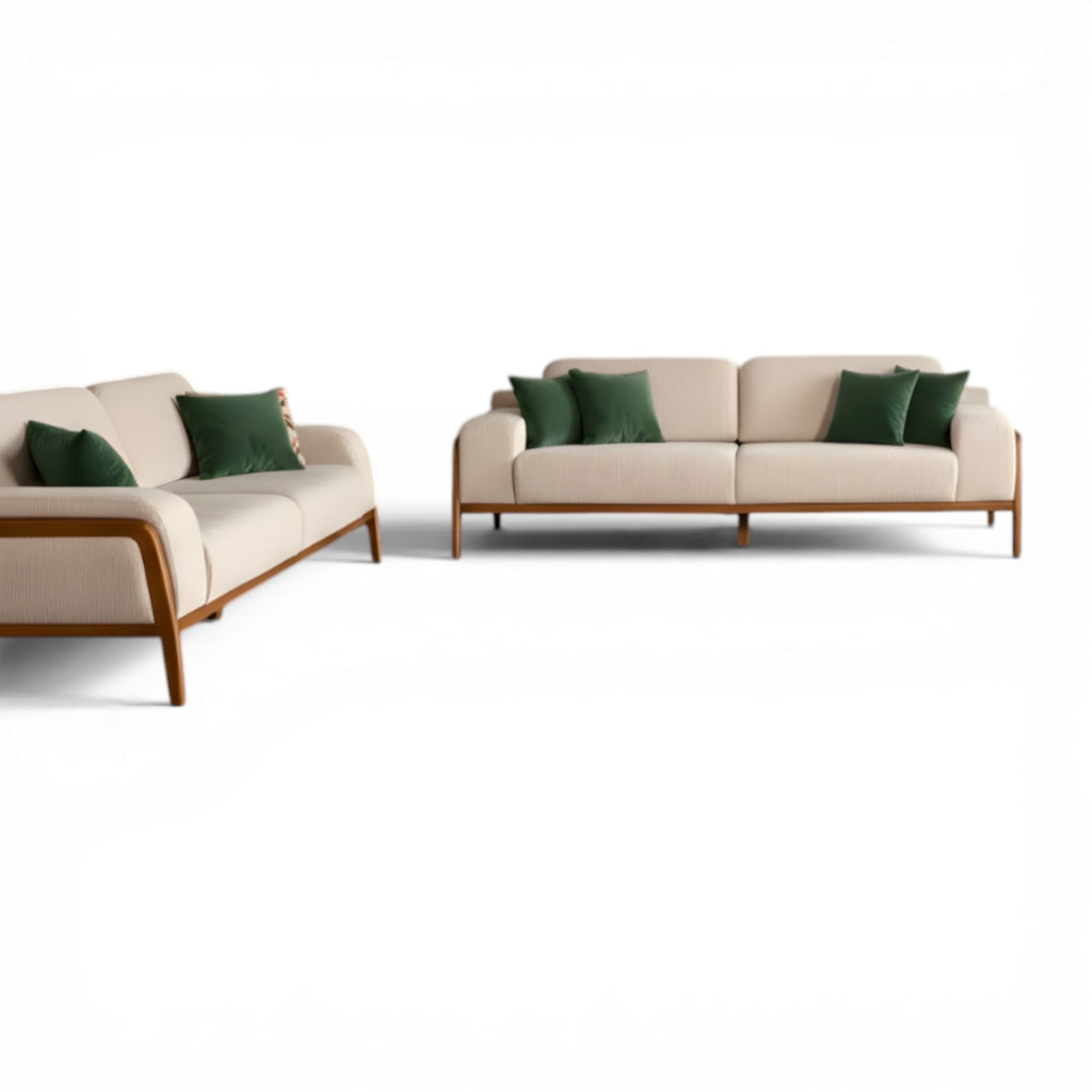 Beige sofa set with green cushions on a white background