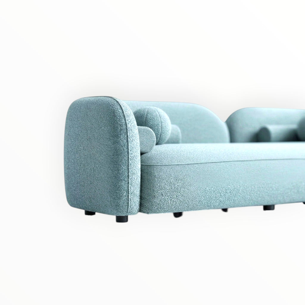 Light blue sofa on a white background