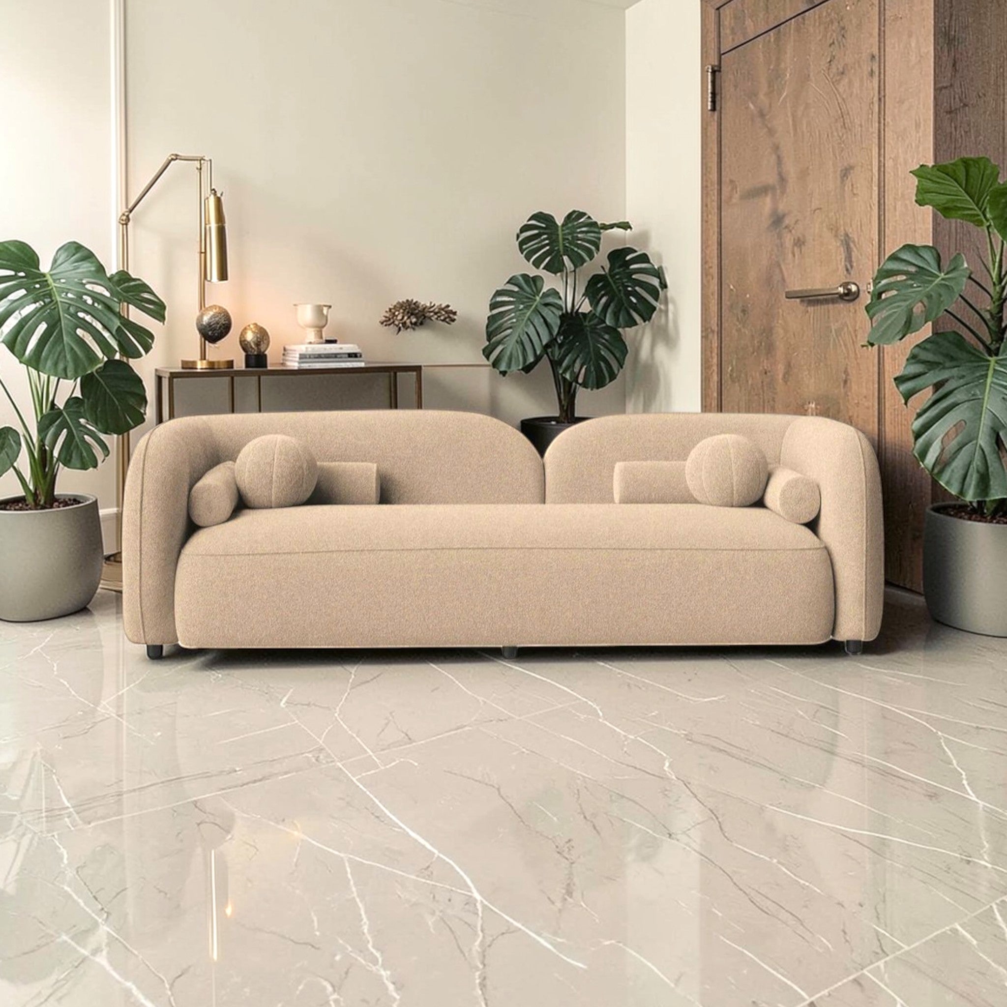 Beige sofa in a modern living room with plants and decor.