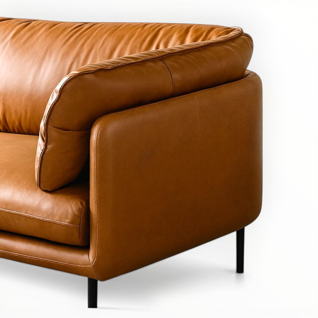 Brown leather sofa on a white background
