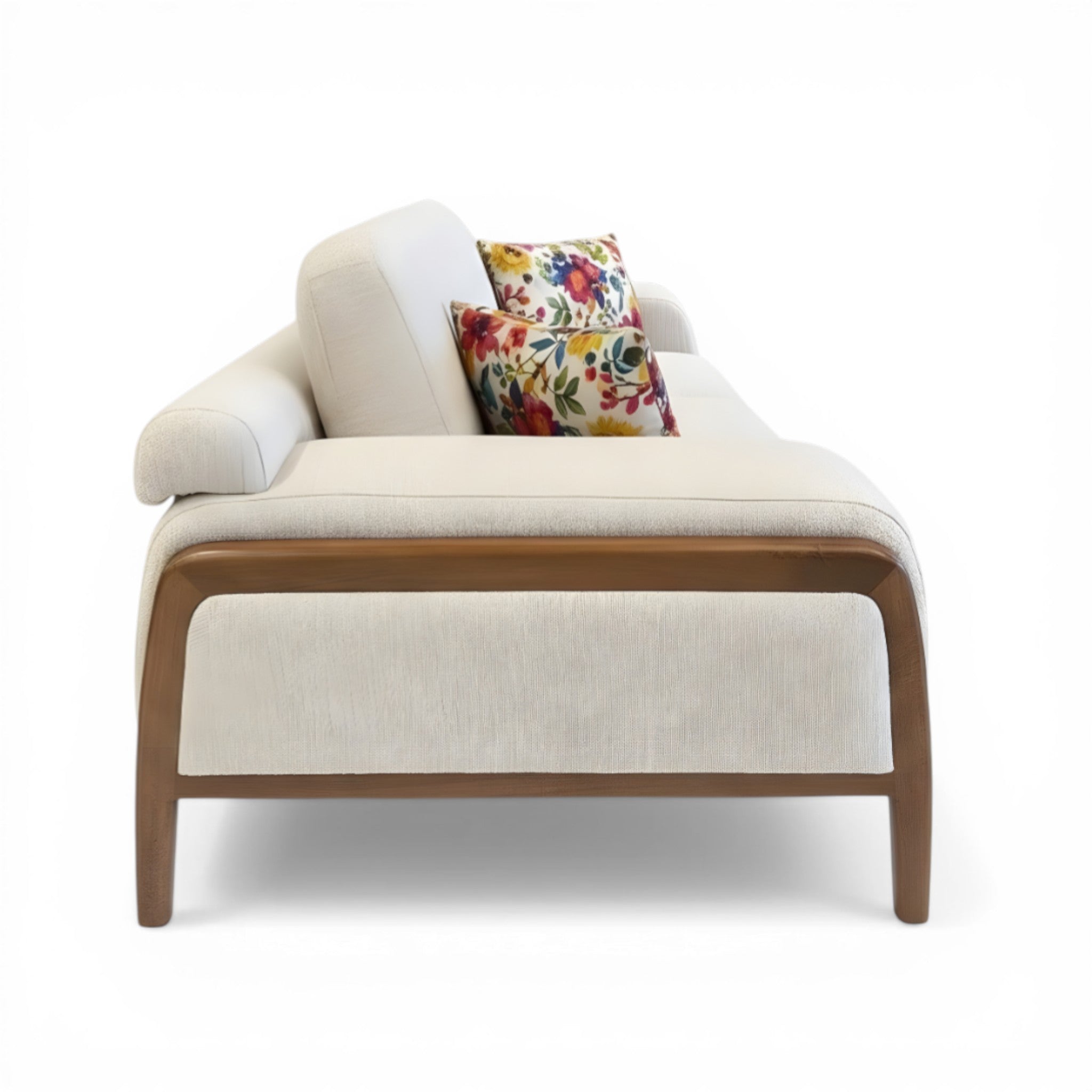 Beige armchair with wooden frame and floral cushions on a white background