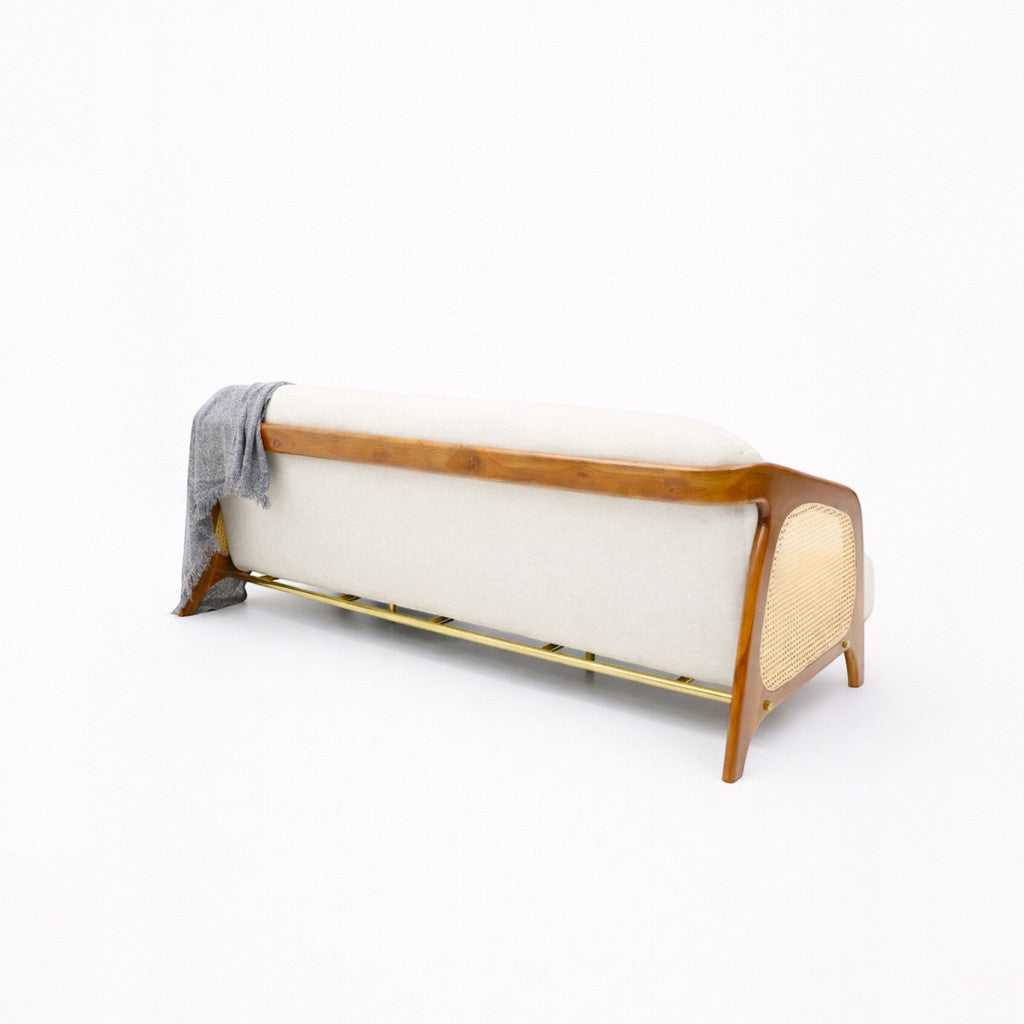 Modern bench with wooden frame and white cushion on a white background