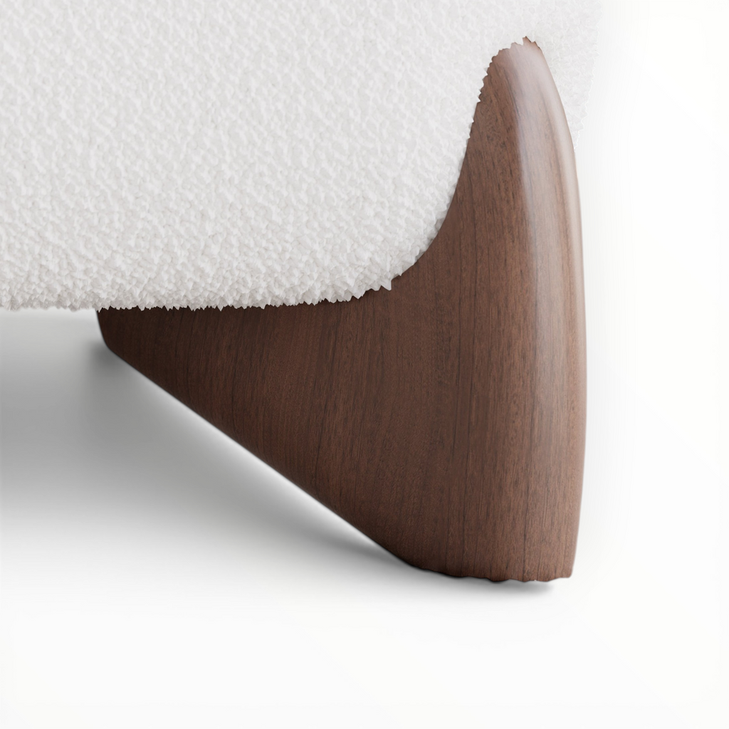 Wooden bed frame leg with white mattress on a light background