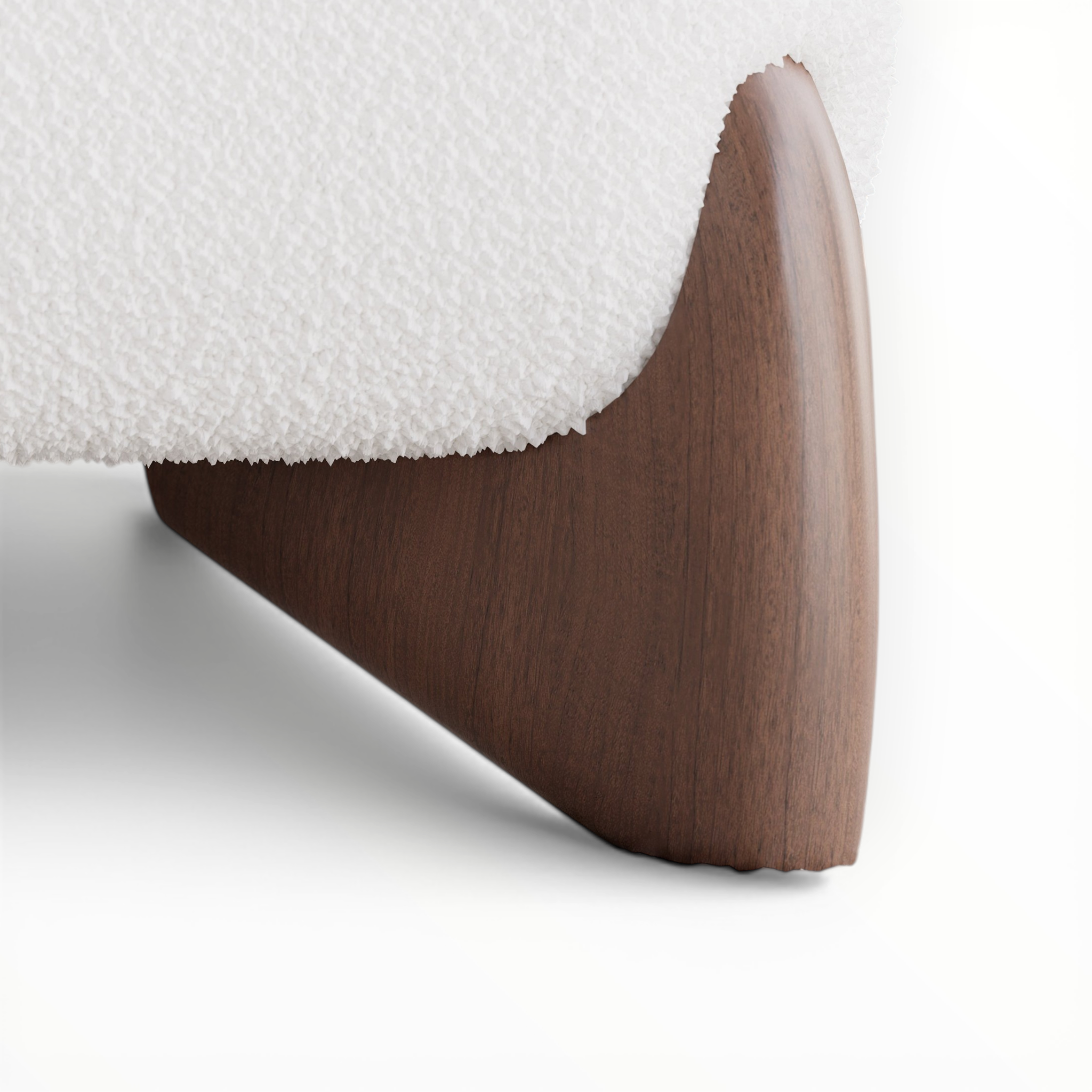 Wooden bed frame leg with white mattress on a light background