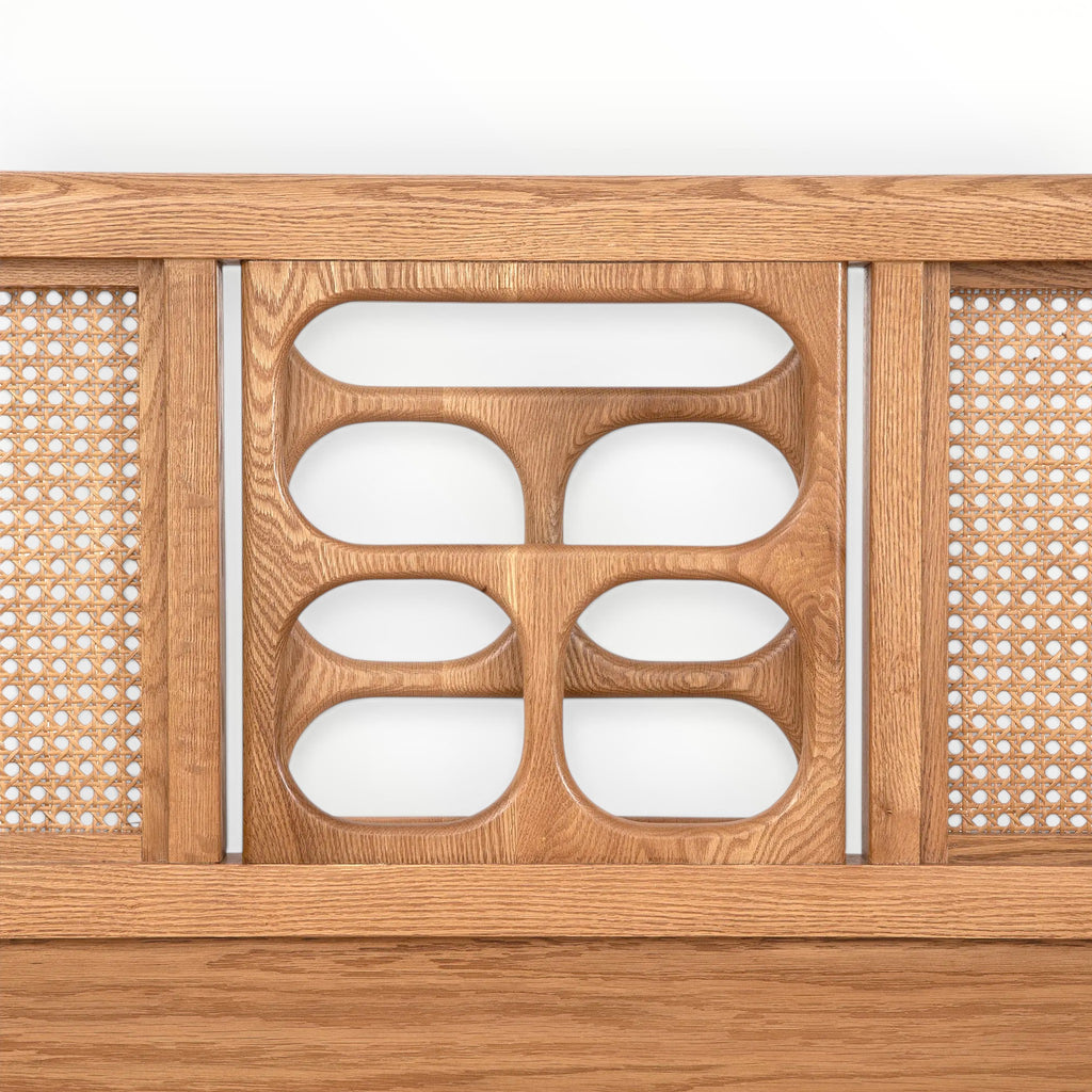 Wooden panel with geometric cutout design on a white background