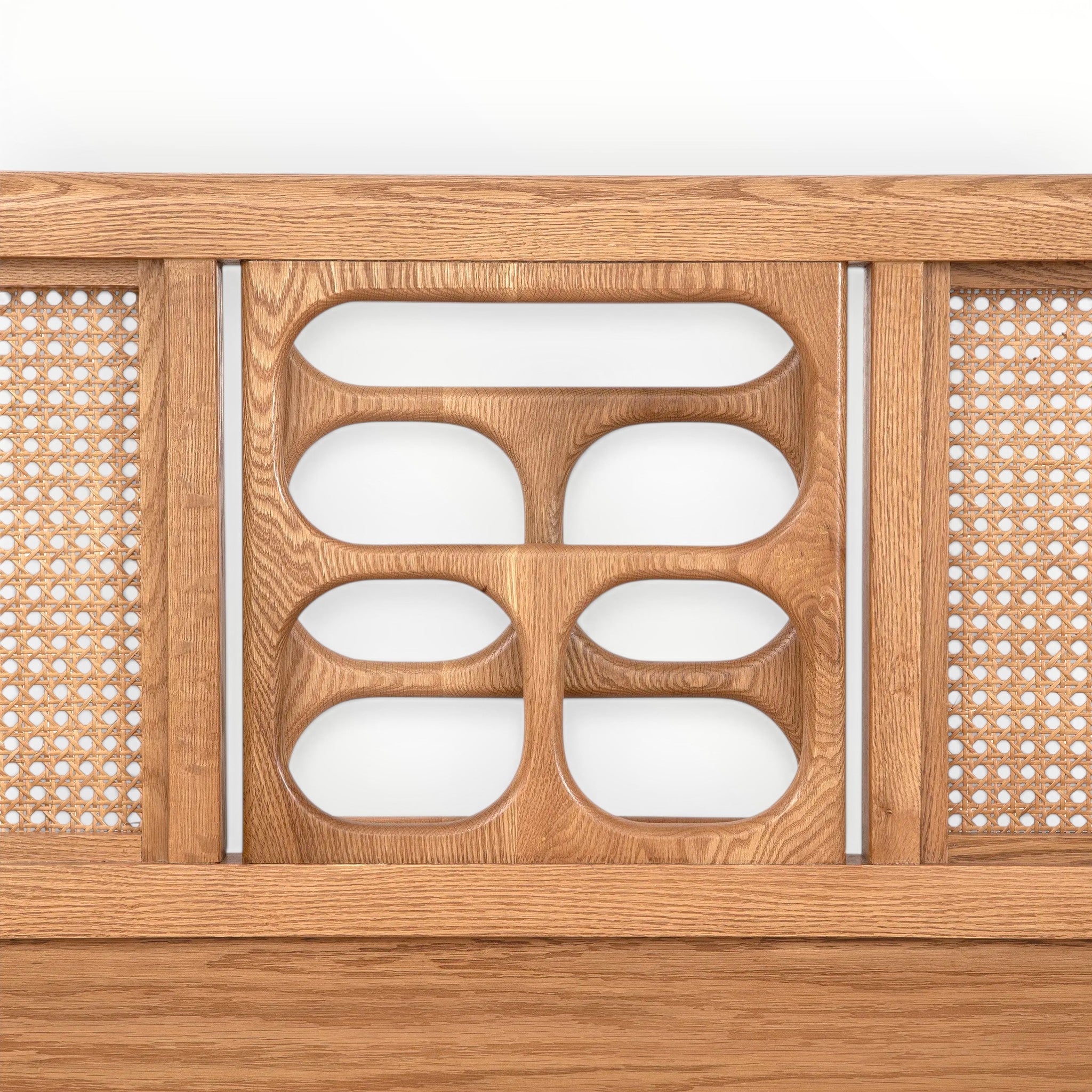 Wooden panel with geometric cutout design on a white background