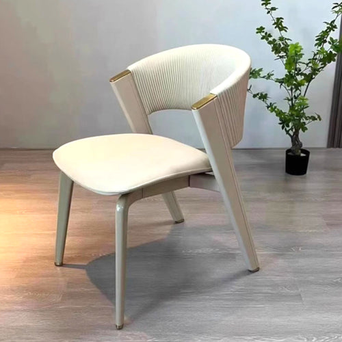 Modern chair with beige cushion on a wooden floor