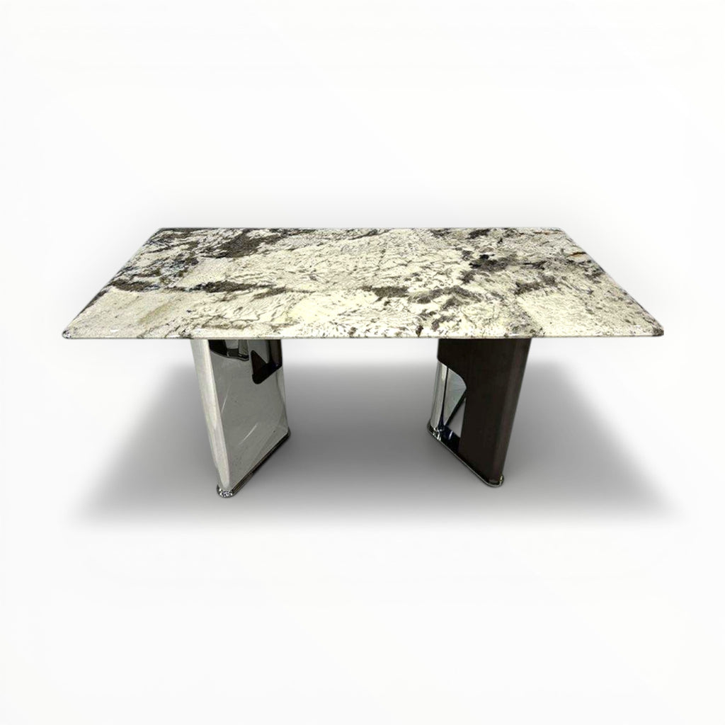 Dining table with marble-like surface on a white background