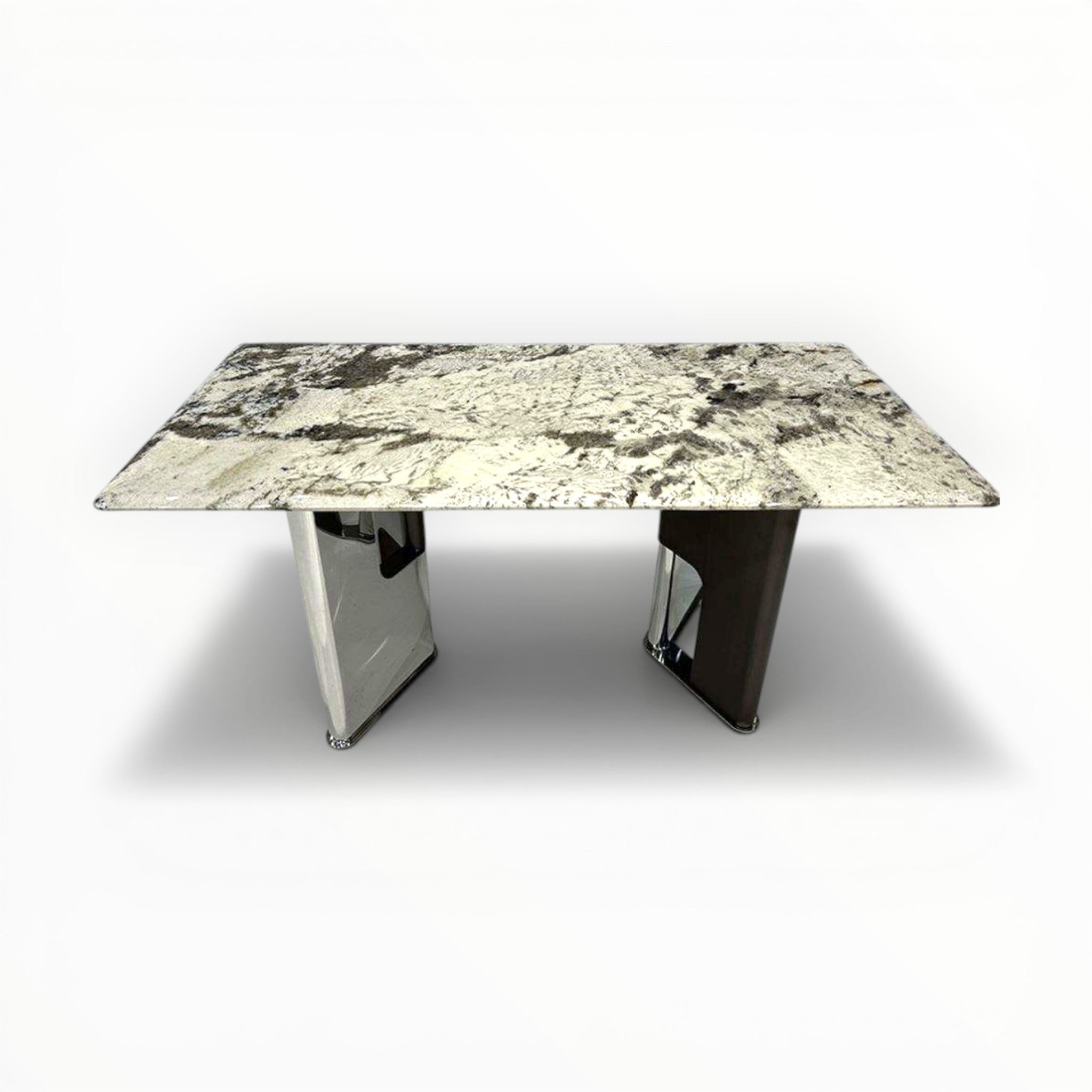 Dining table with marble-like surface on a white background