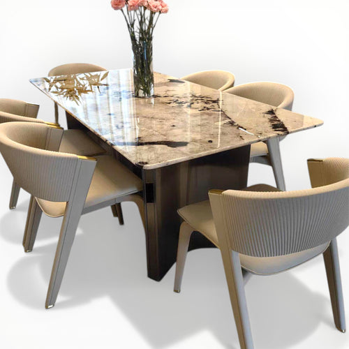 Dining table set with marble-like surface and six chairs on a white background