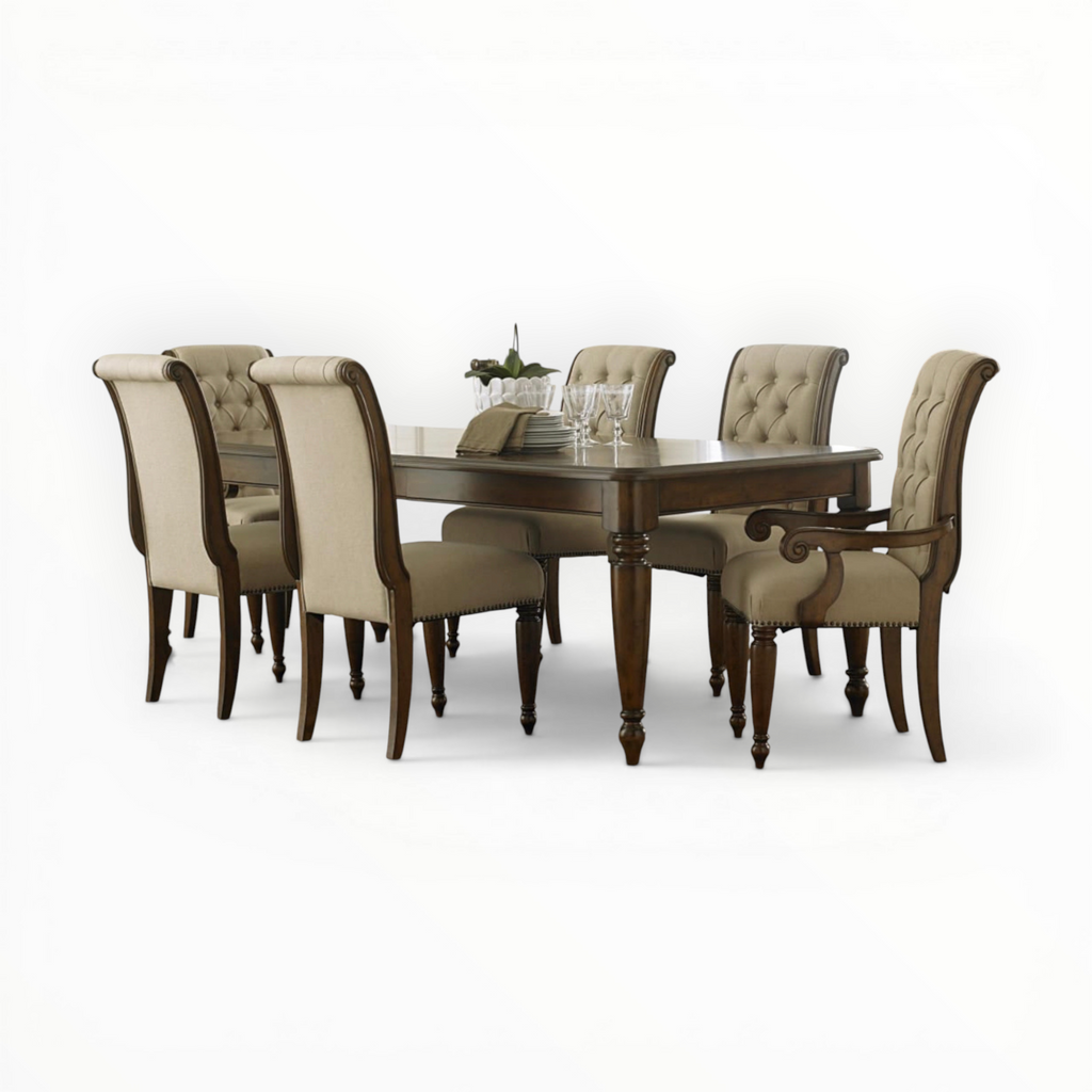 Dining table set with six chairs on a white background