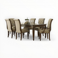 Dining table set with six chairs on a white background