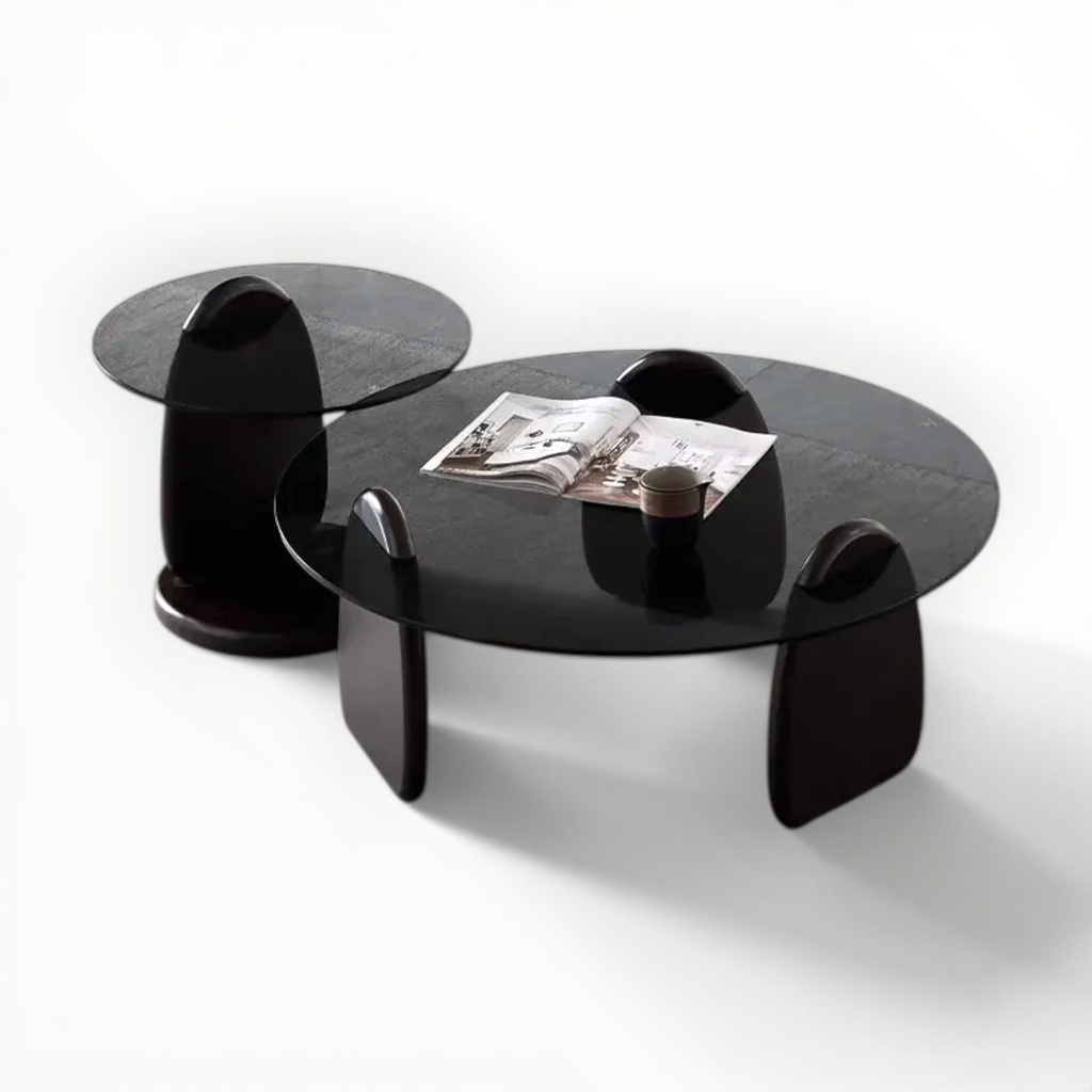 Modern black coffee table with a glossy finish on a white background