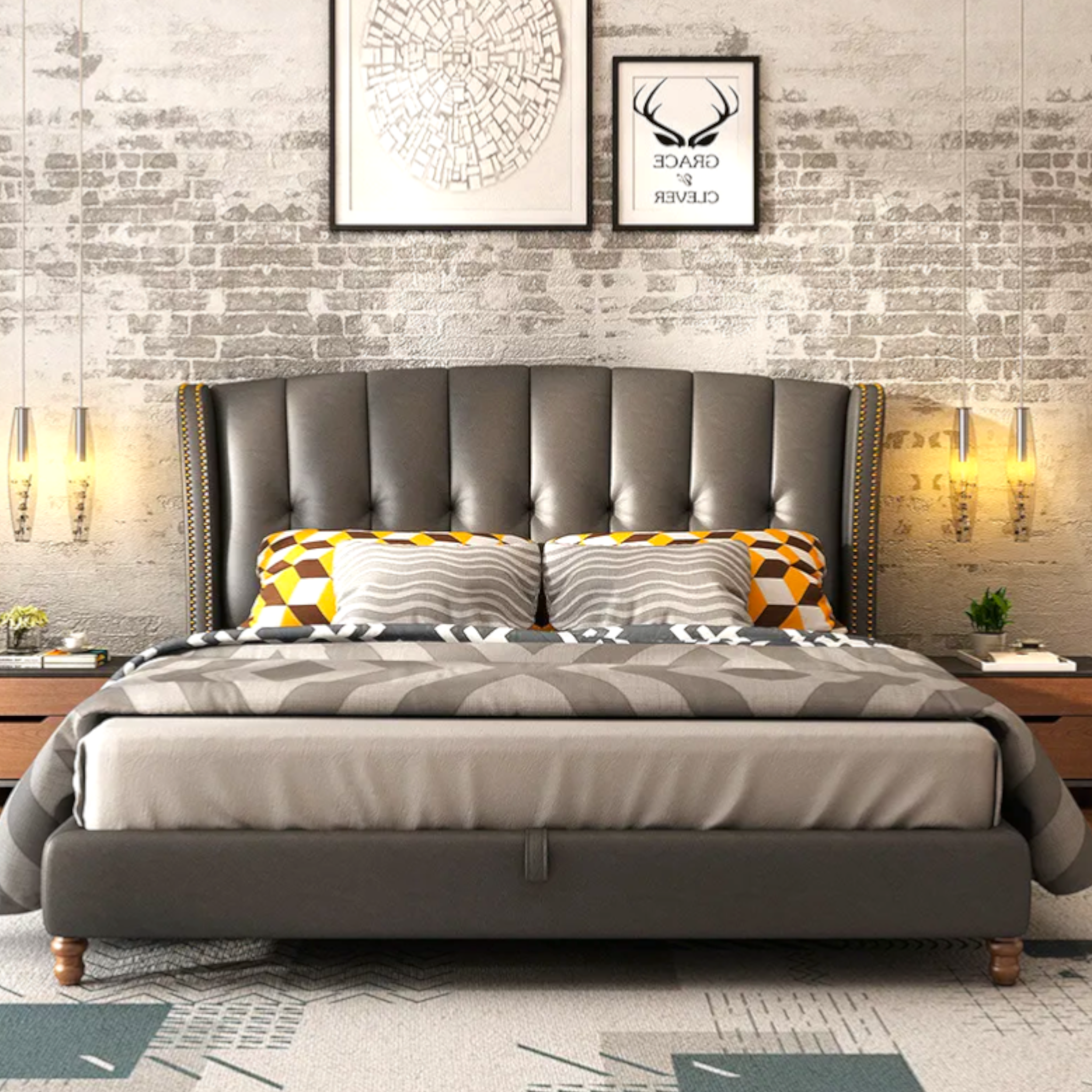 Gray upholstered bed with patterned bedding in a room with brick walls and framed artwork.