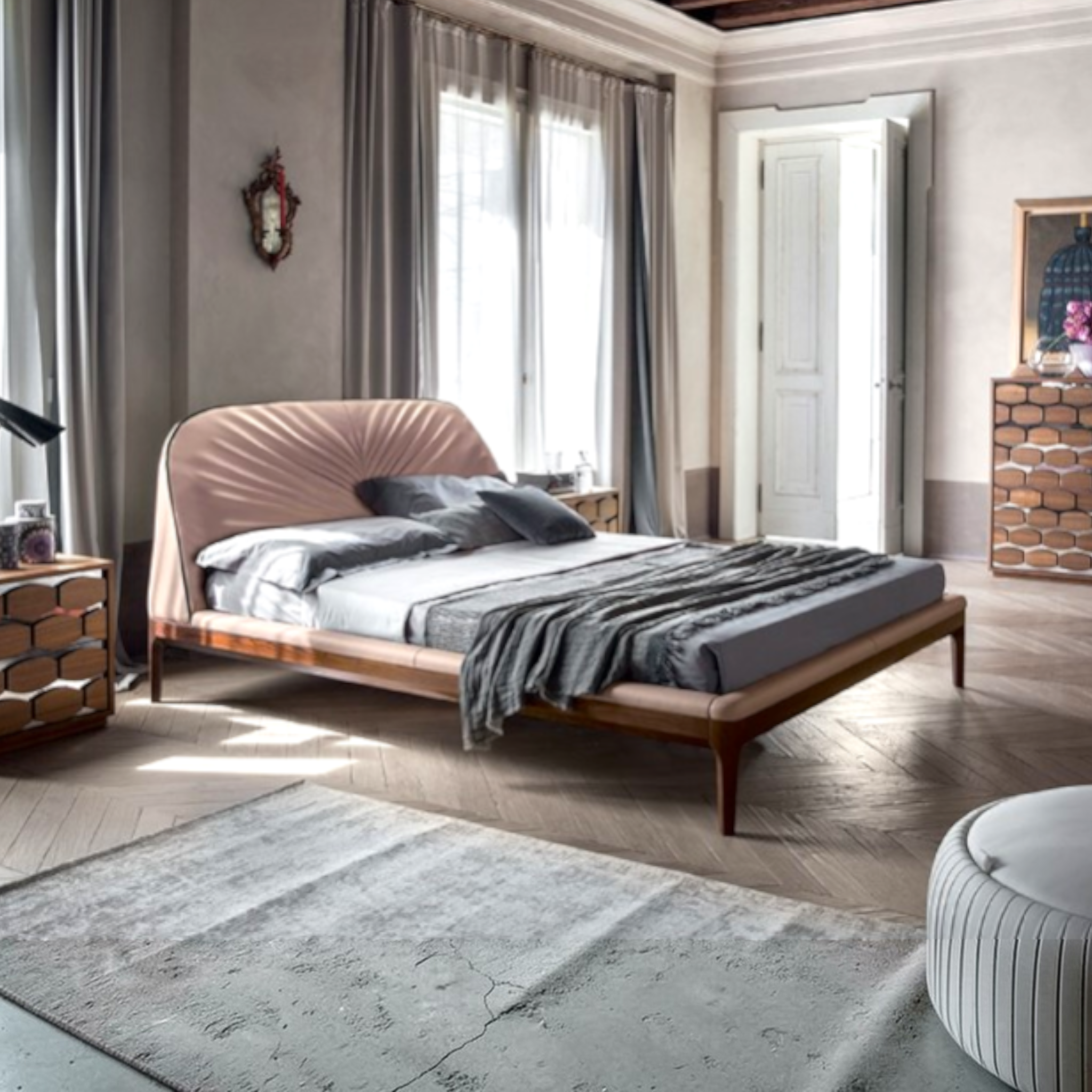 Modern bedroom with a wooden bed, gray bedding, and decorative elements.