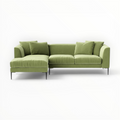 Green sectional sofa on a white background
