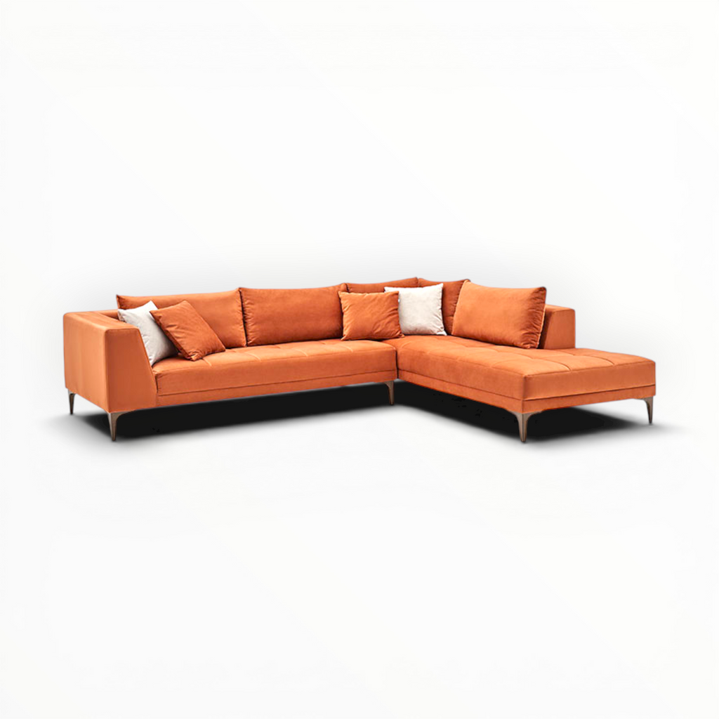 Orange sectional sofa with cushions on a white background