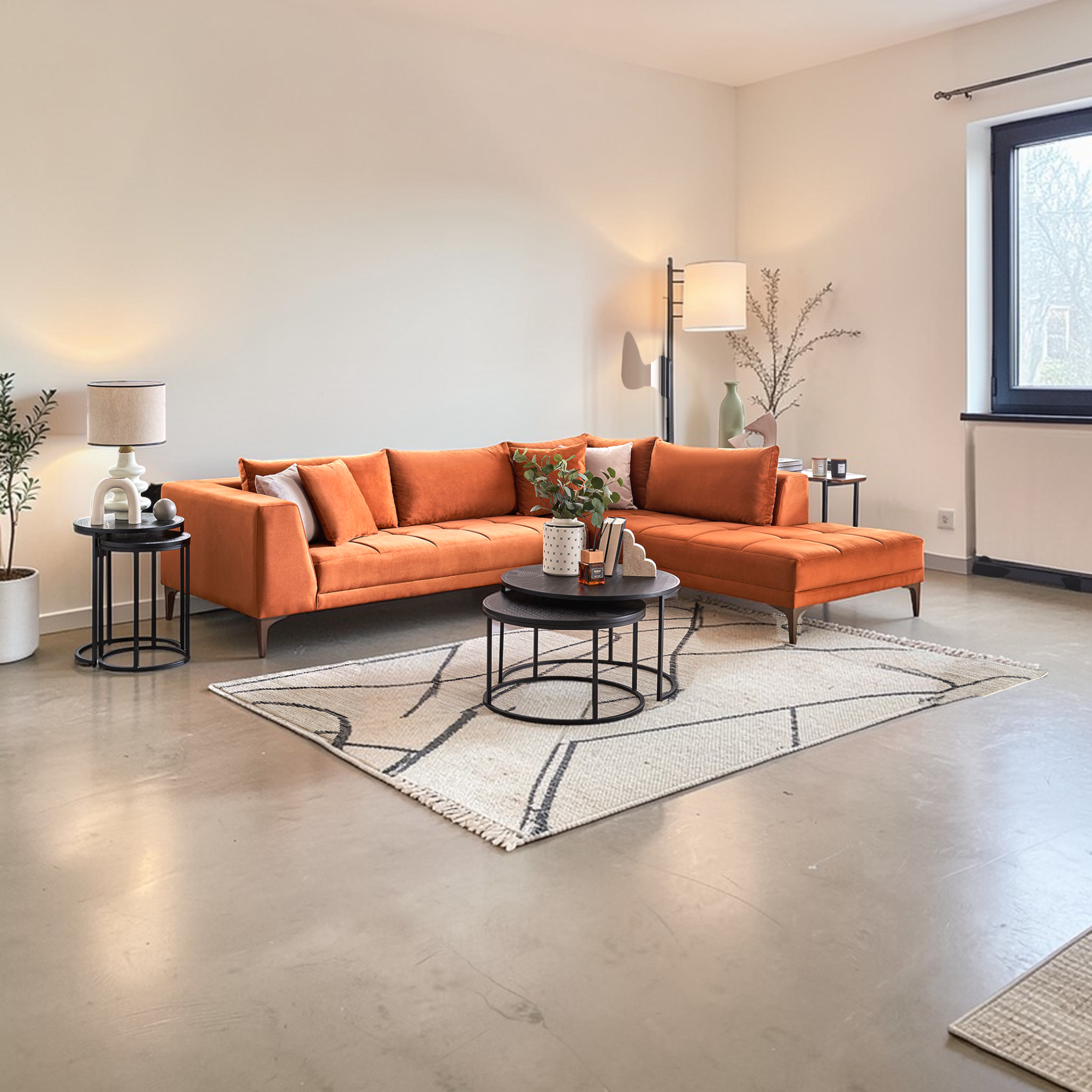 Modern living room with an orange sectional sofa, coffee table, and decorative items.