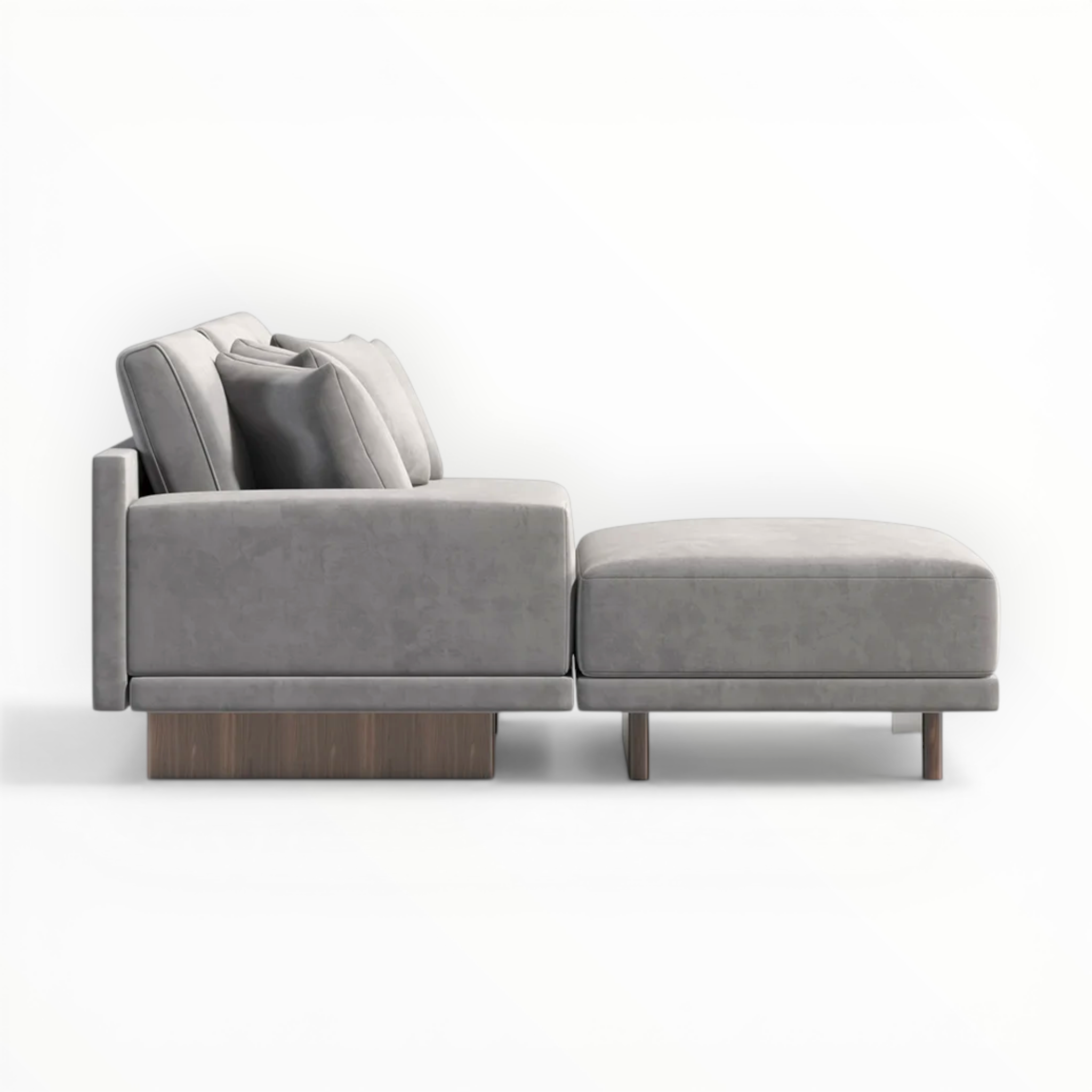 Gray sectional sofa with ottoman on a white background