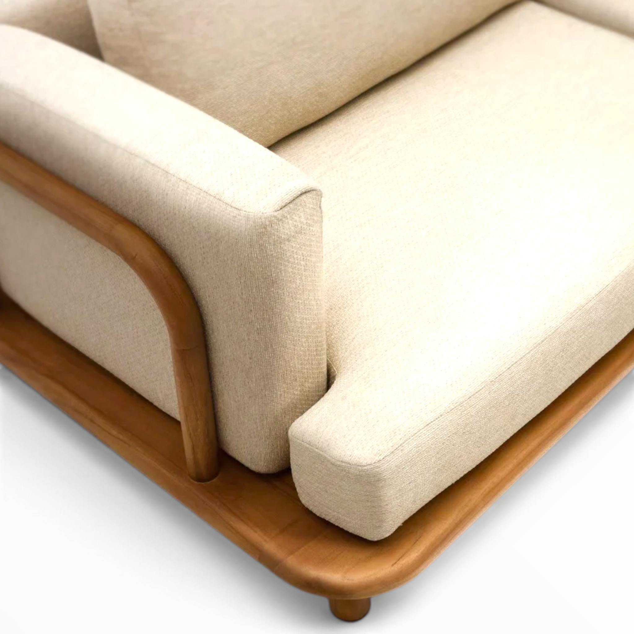 Arcadia teakwood sofa close-up of rounded teak arm and cream woven upholstery - Woodkraft Studio Hyderabad
