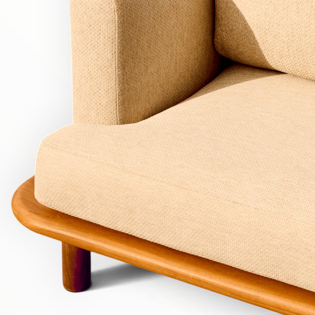 Arcadia teakwood lounge chair detail of cylindrical teak leg and rounded platform base edge — Woodkraft Studio Hyderabad