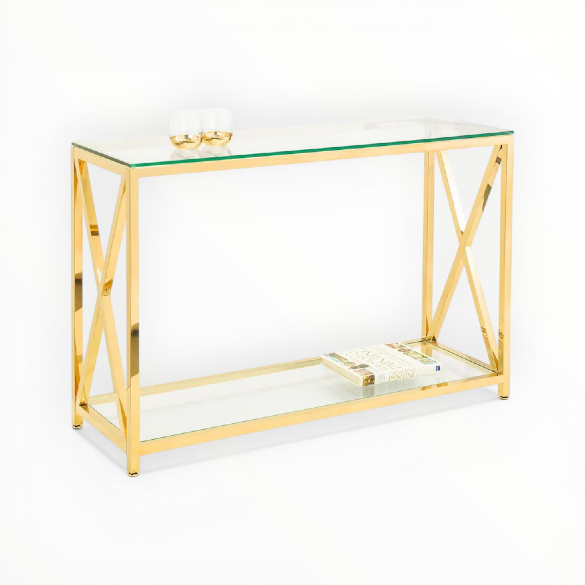 Gold console table with glass top and shelf on a white background