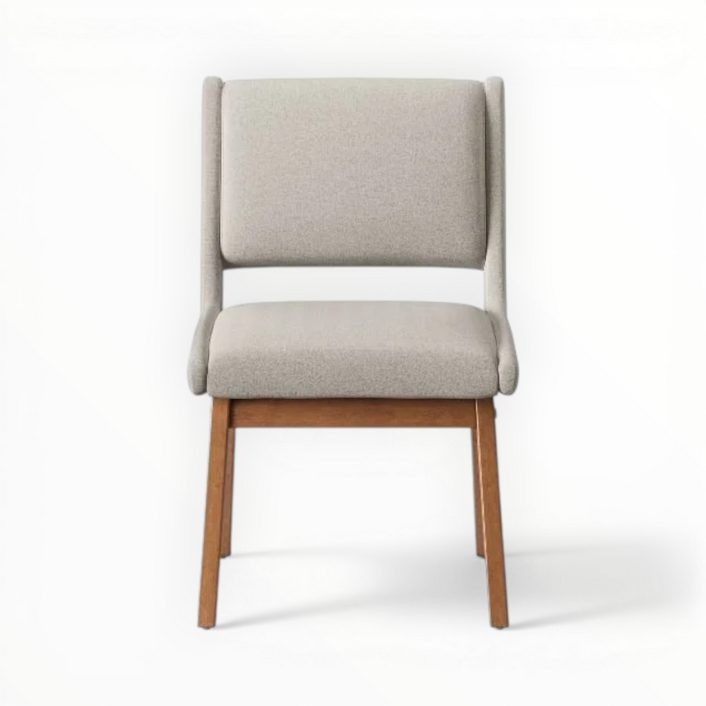 Gray upholstered chair with wooden legs on a white background