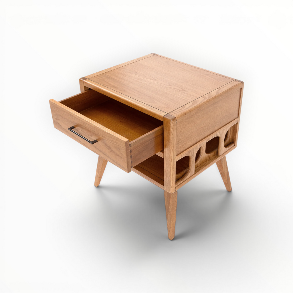Wooden side table with a drawer on a white background