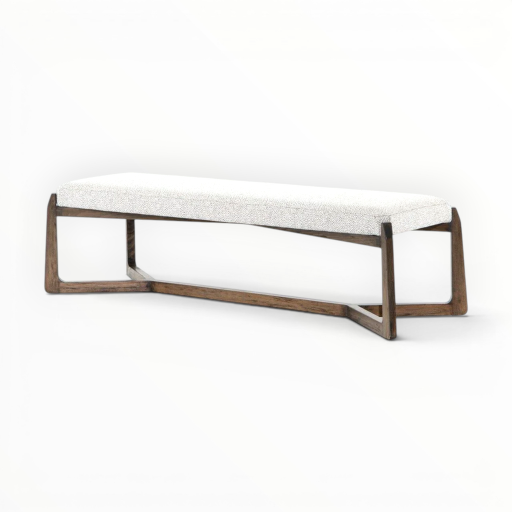 Bench with white cushion and wooden frame on a white background