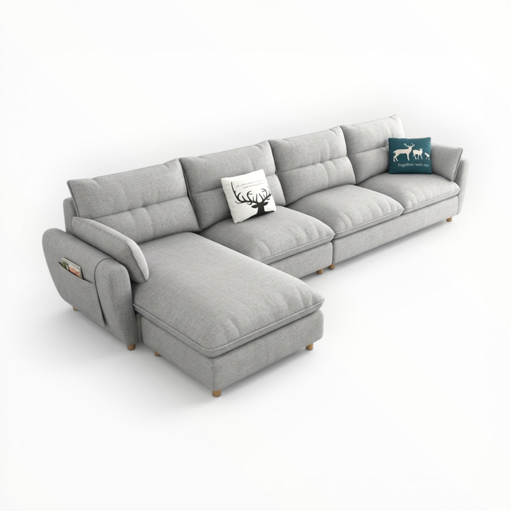 Gray sectional sofa with two cushions on a white background