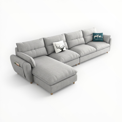 Gray sectional sofa with two cushions on a white background