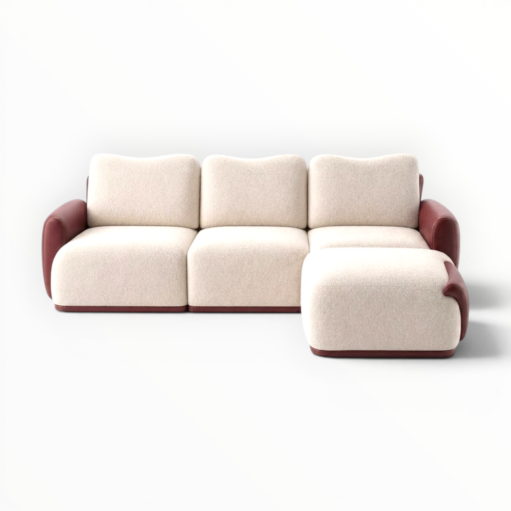 Modern beige sofa with red accents on a white background