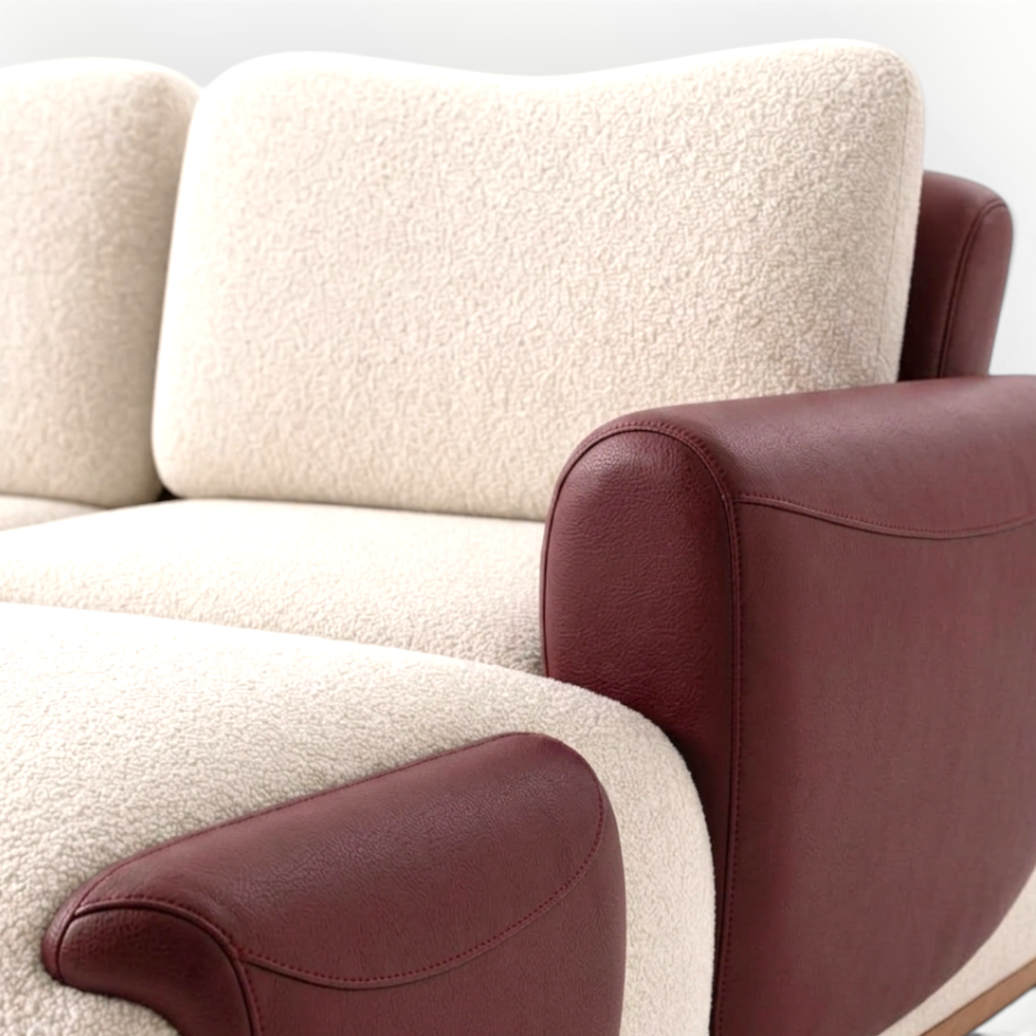 Beige sofa with brown leather armrests on a white background