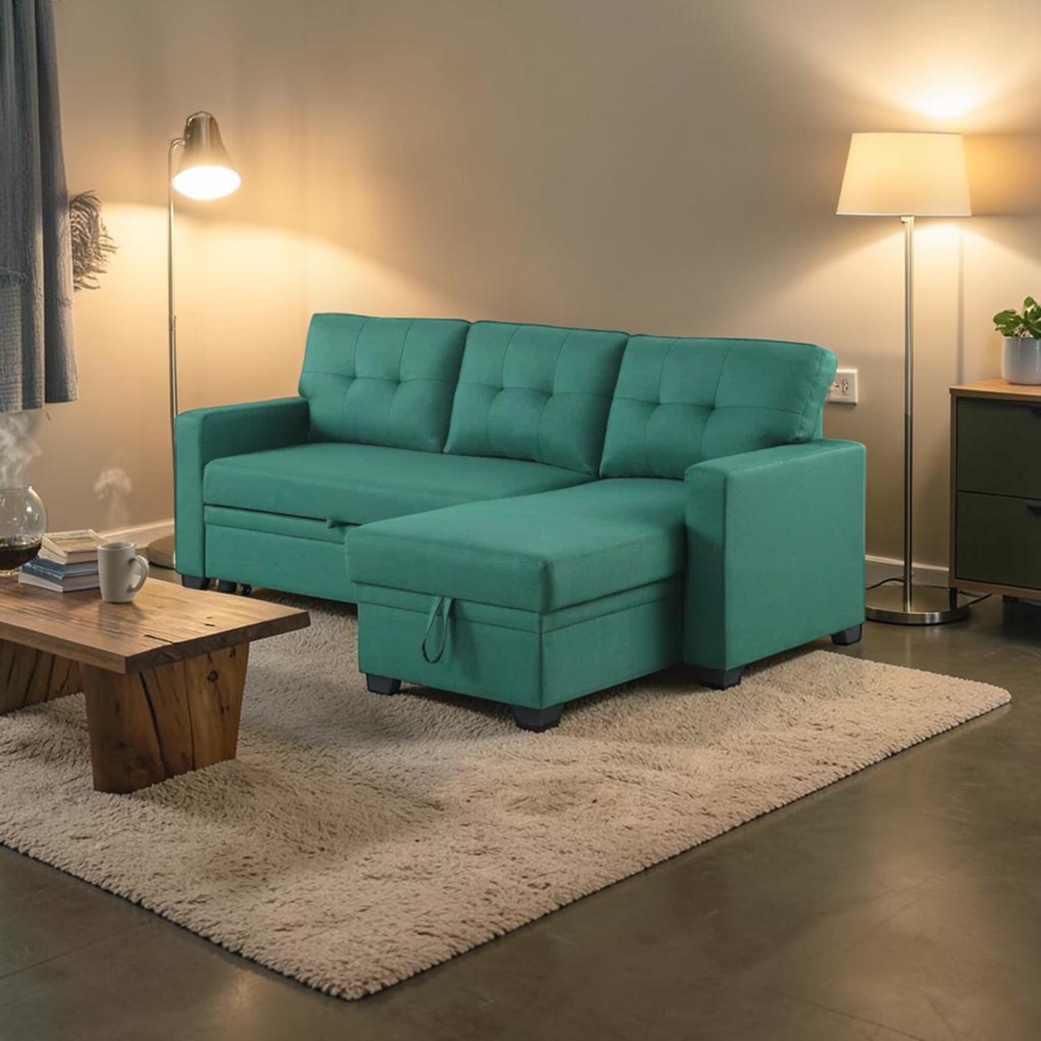Turquoise sectional sofa in a living room setting with wooden coffee table and lamps.