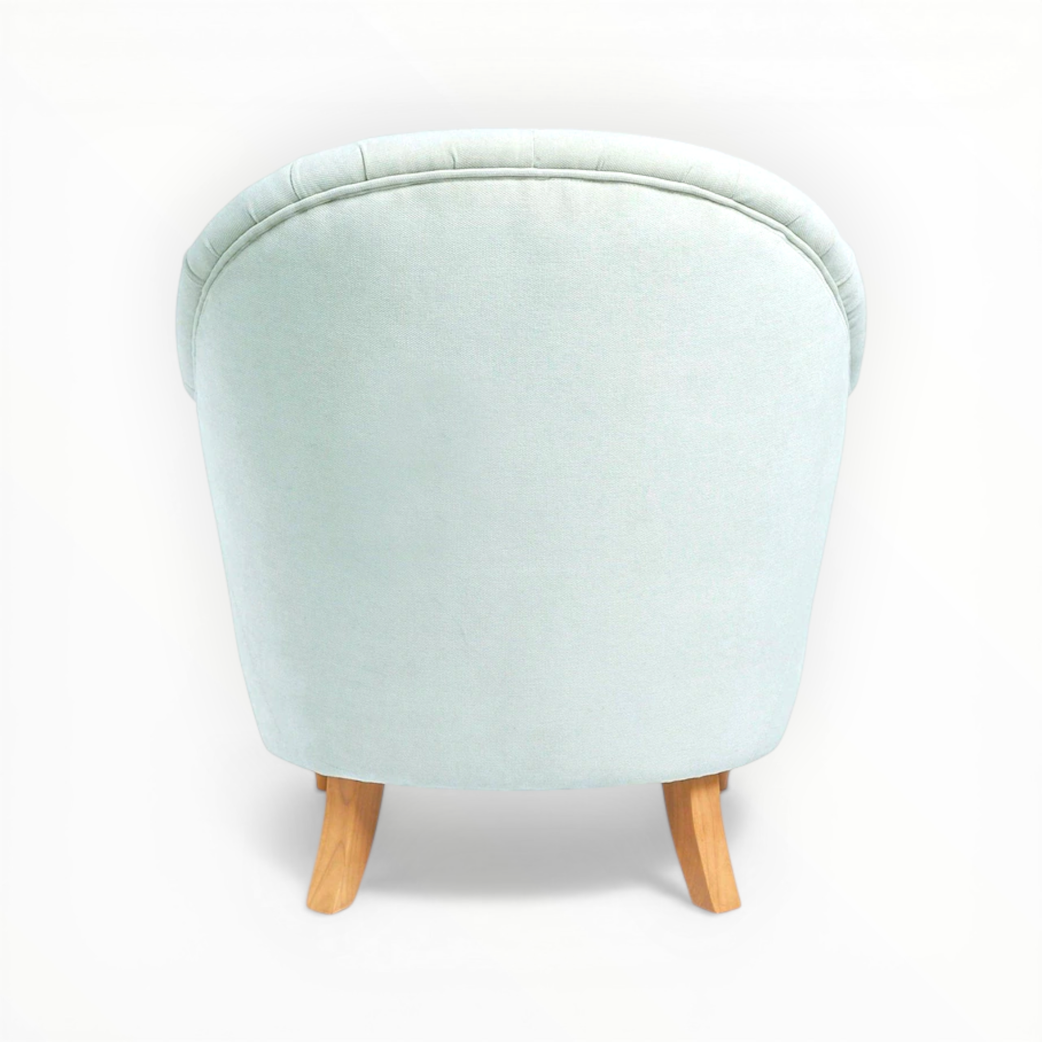 Light blue ottoman with wooden legs on a white background
