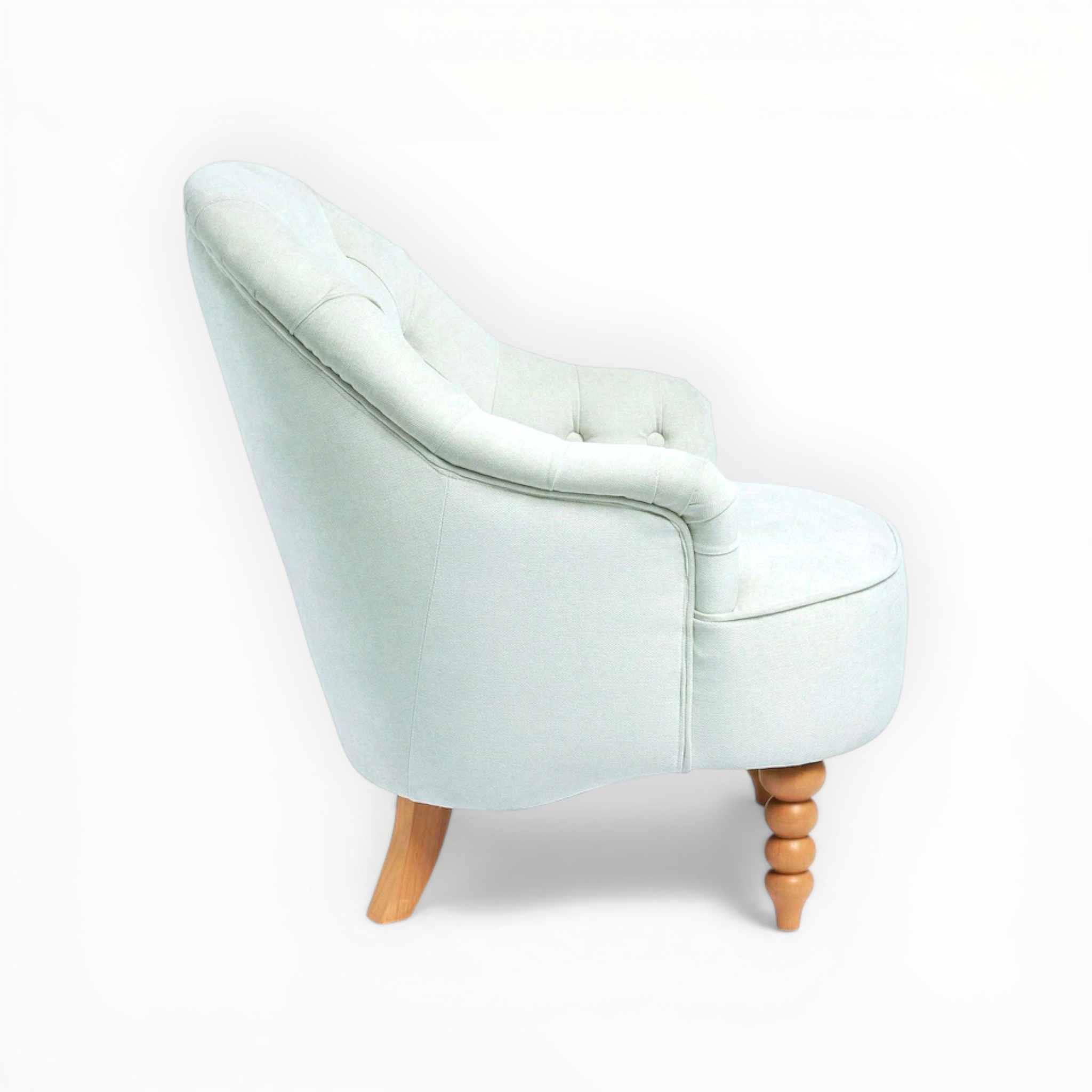 Light blue armchair with wooden legs on a white background