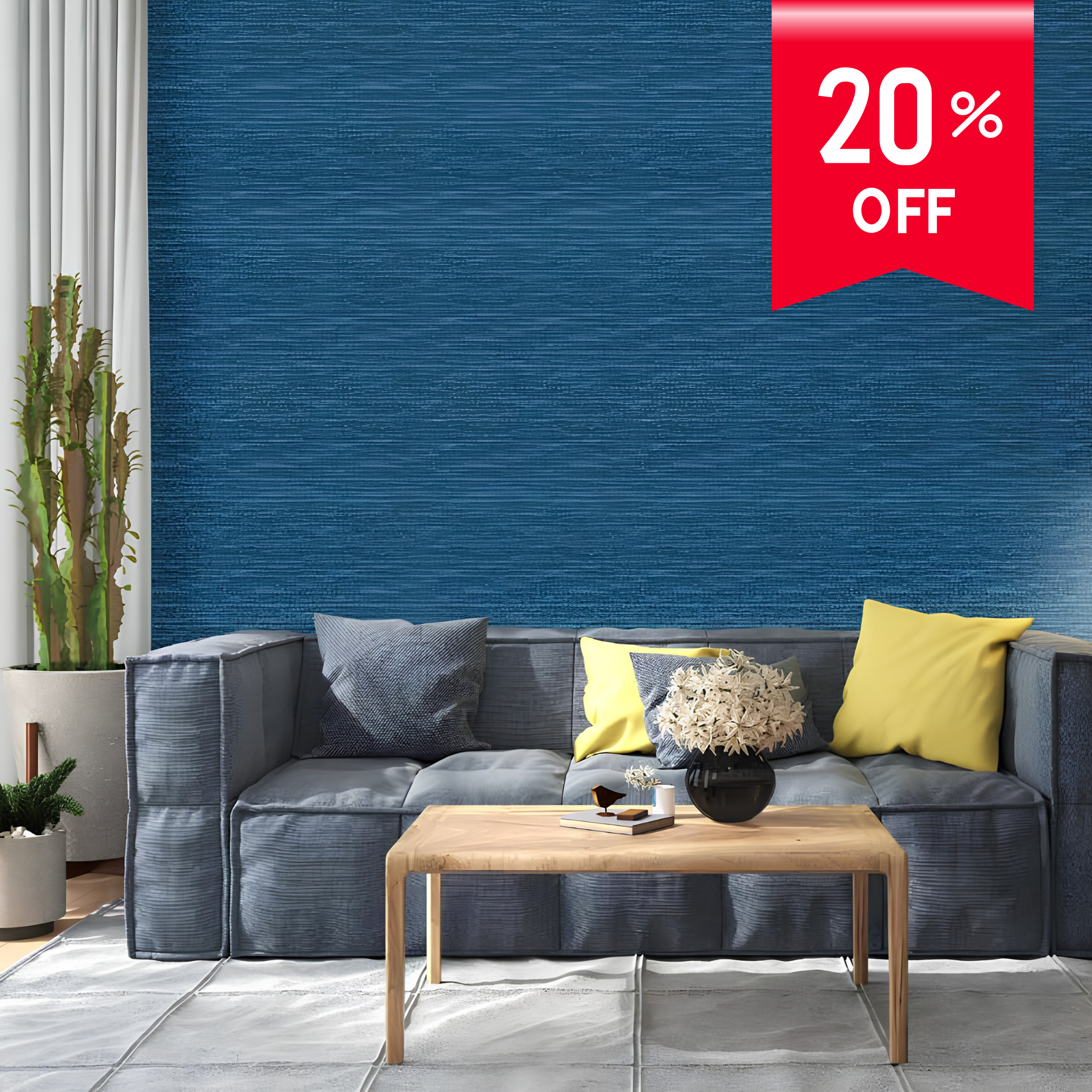 Modern living room with a gray sofa, wooden coffee table, and decorative items against a blue wall with a 20% off sign.