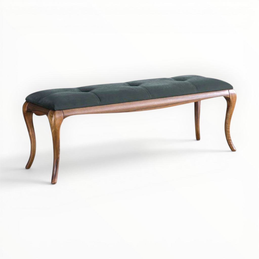 Wooden bench with green cushion on a white background
