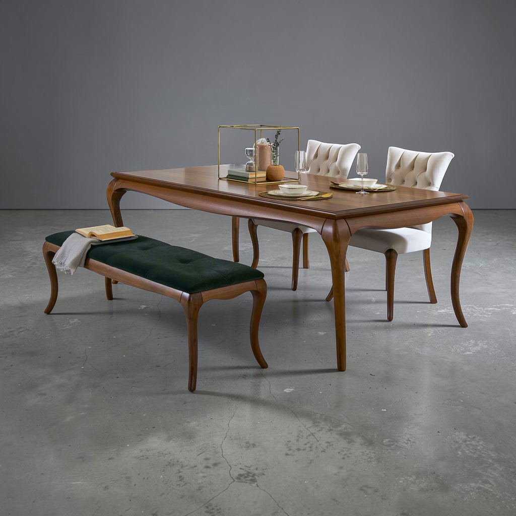 Dining table with chairs and a bench in a minimalistic setting