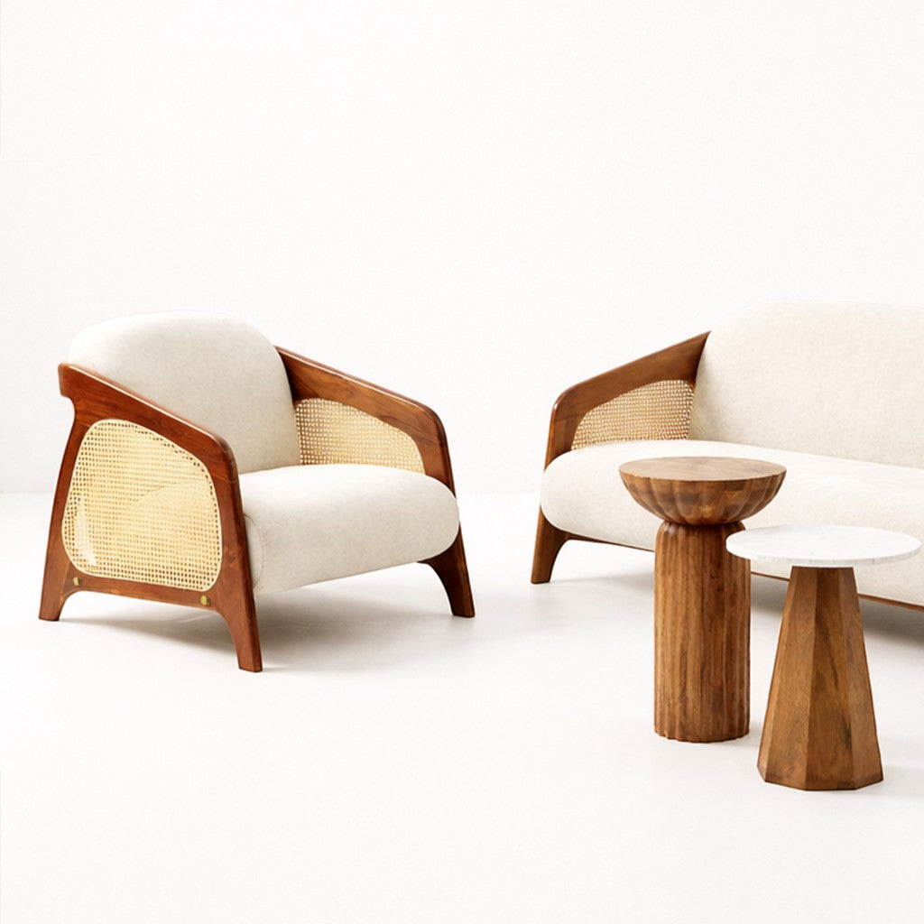 Two wooden chairs with woven backrests and two small round tables on a white background