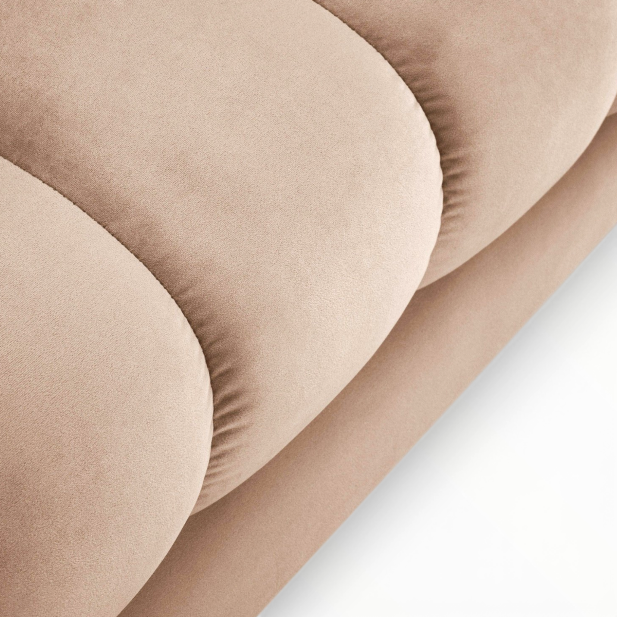 Close-up of a beige bra on a light gray background
