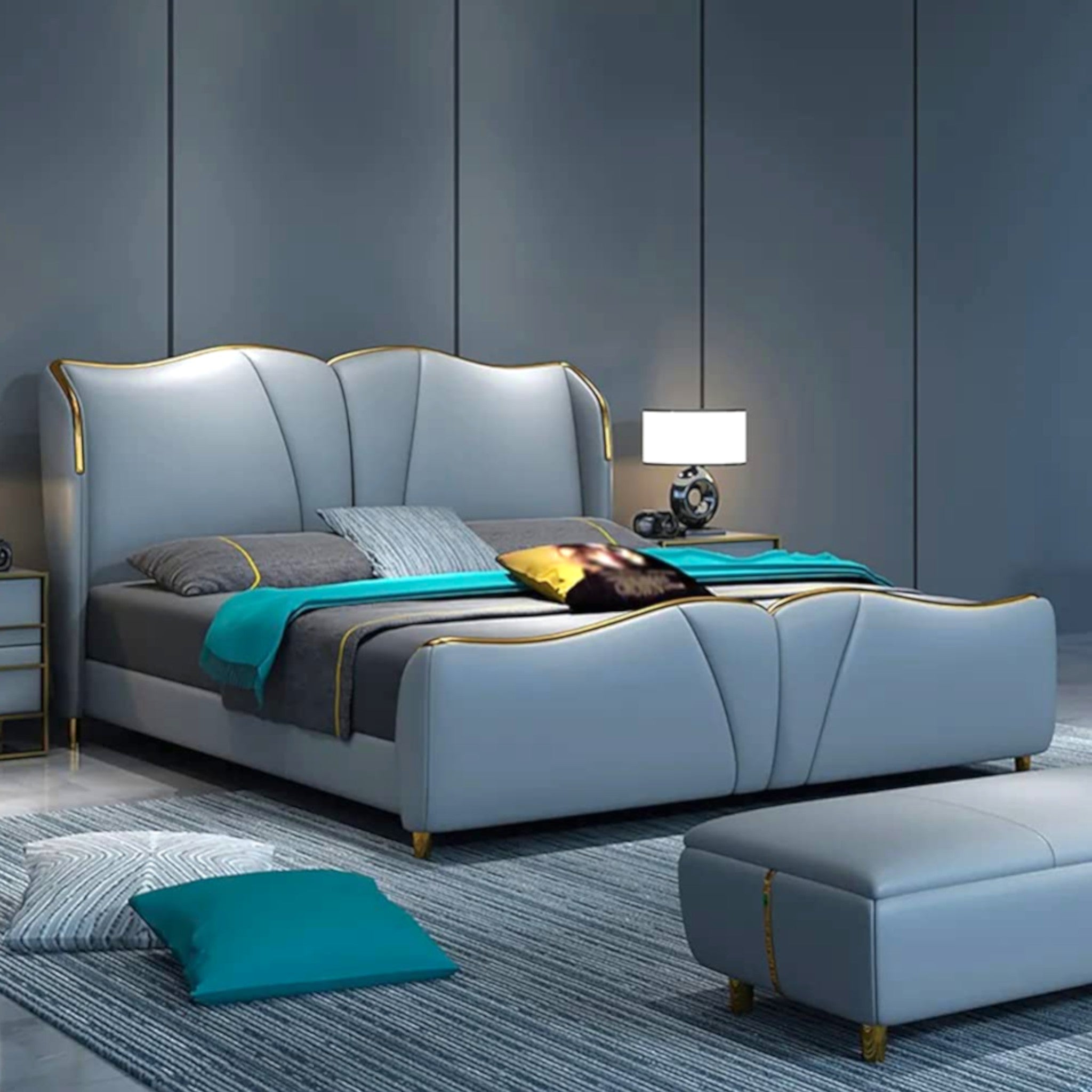 Modern bedroom with a gray upholstered bed and matching ottoman.