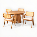 Wooden dining table with four matching chairs on a white background