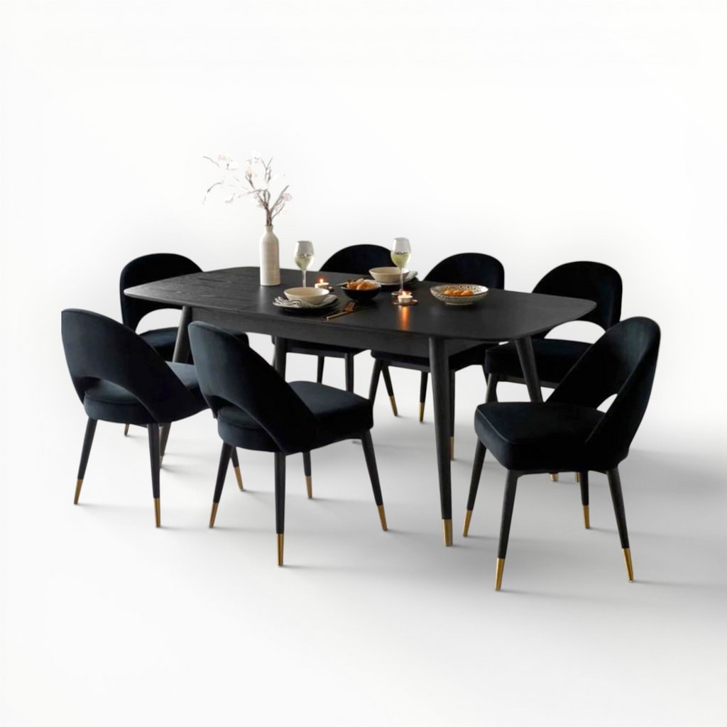 Black dining table with chairs on a white background