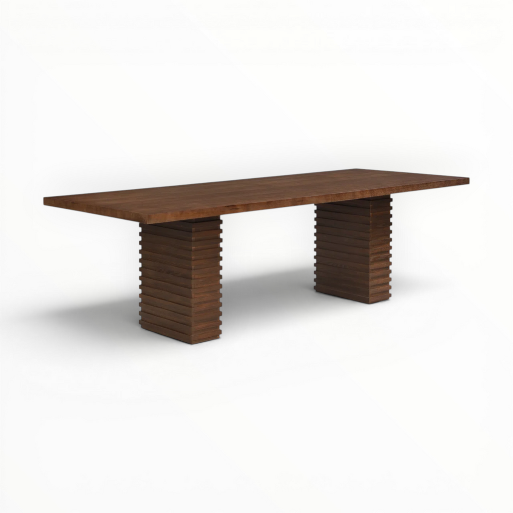 Wooden table with a unique base design on a white background