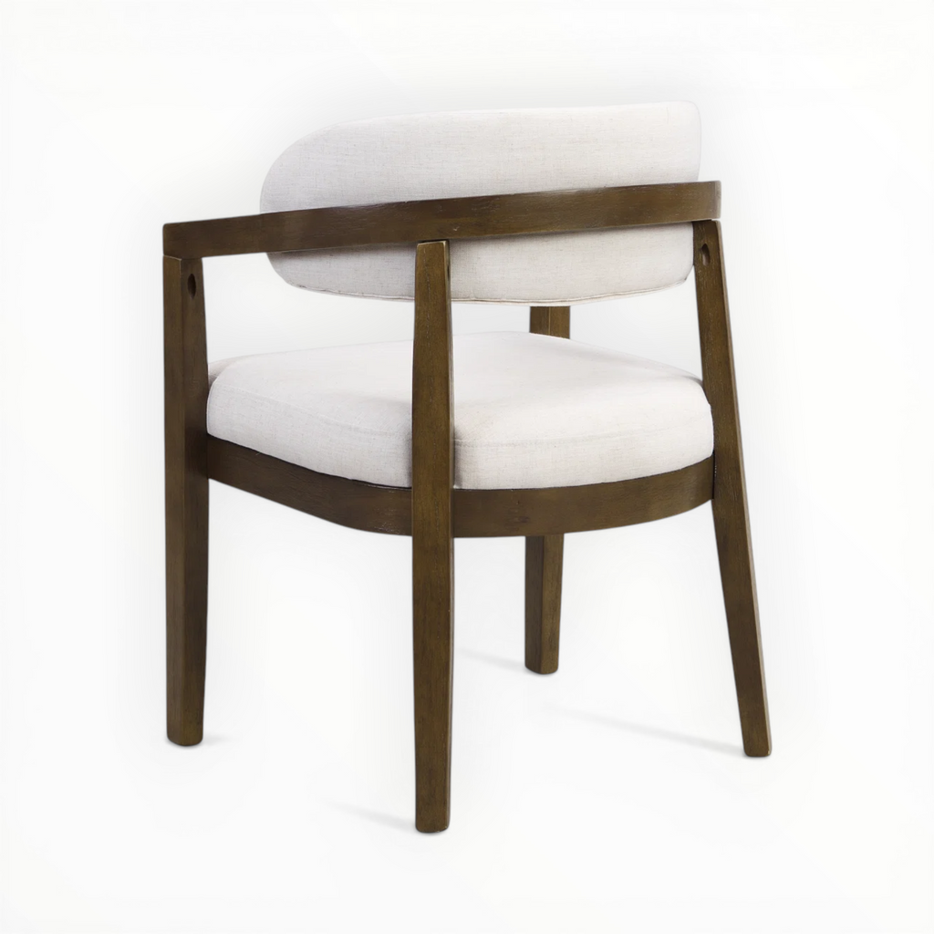 Chair with white cushioned seat and backrest on a white background
