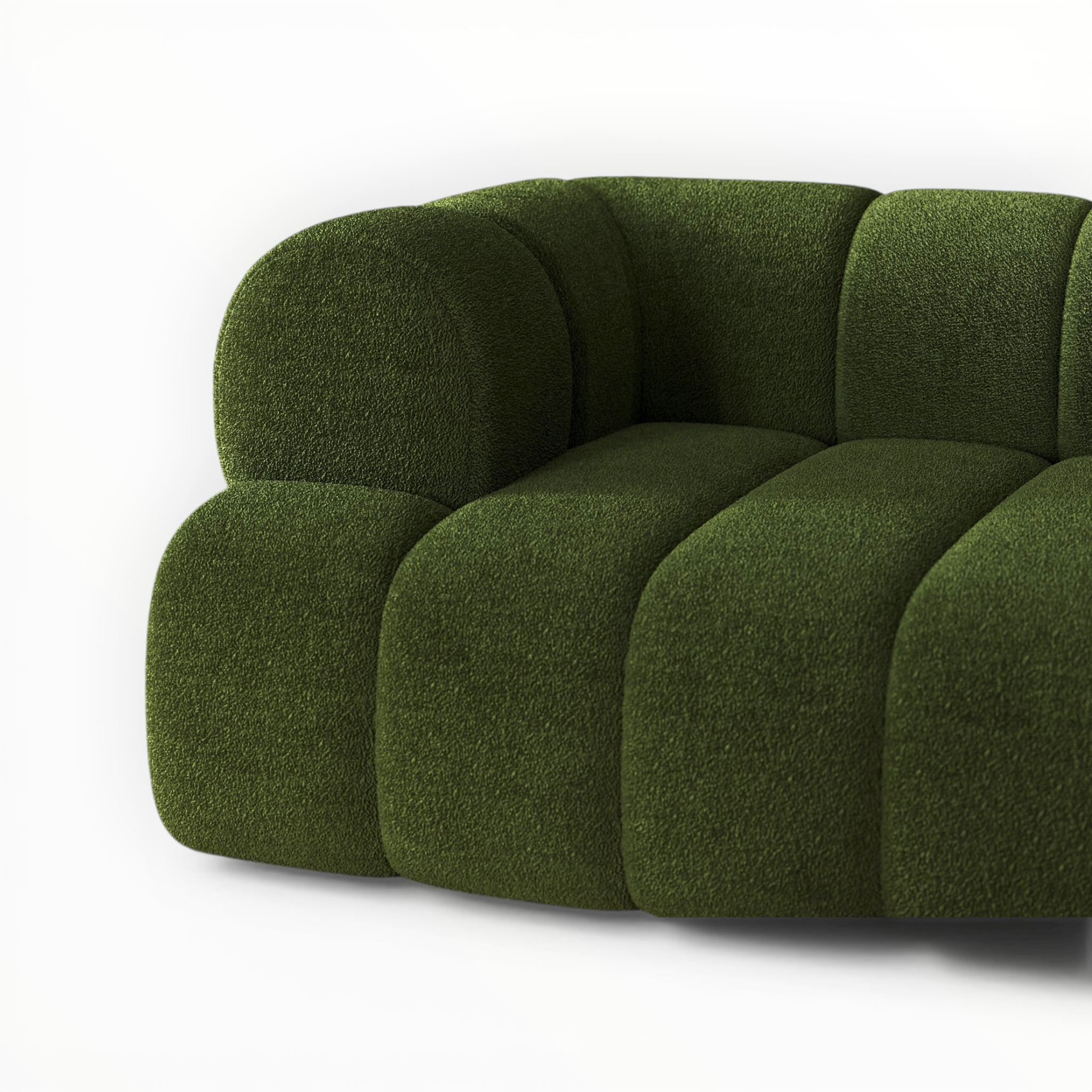 Green sofa with a textured surface on a white background
