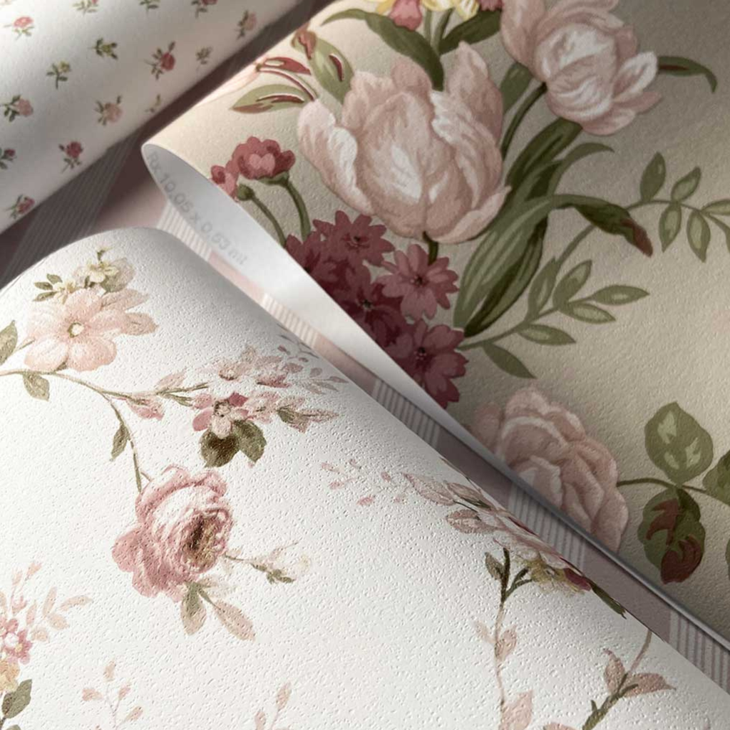 Floral wallpaper with pink roses and green leaves on a light background